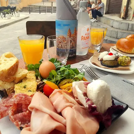 Alojamento de Acomodação e Pequeno-almoço Benvenuti Al Sud